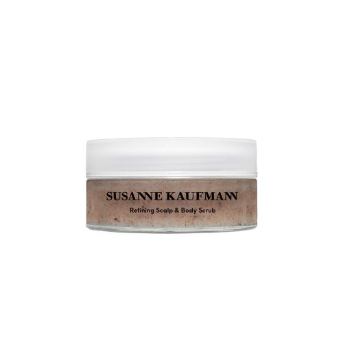 Elevate your skincare routine with Susanne Kaufmann's versatile oil-based refining body scrub, deeply exfoliating skin and promoting scalp health.