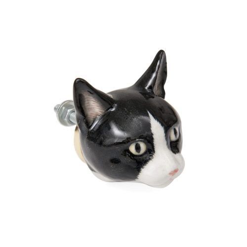 And Mary's new hand-painted porcelain doorknob, a perfect match for their black and white cat necklace, cat enthusiasts rejoice.